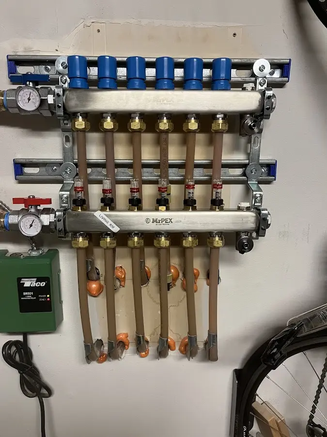 Plumber performing Water Heater Repair at a residential property in Downingtown